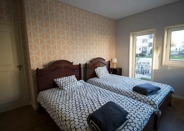 Habitación en casa particular 70s House By Capicua Braga